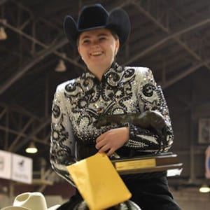 It was a bit of a marathon, but Juliana Blackburn-Baskin outlasted and outworked the competition to win the NSBA and AQHA divisions of Novice Amateur Horsemanship with her horse, Floating On Assets. Photo © NSBA