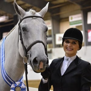Maria Salazar and Winkin For Chocolate worked hard to receive the AQHA and NSBA Congress champion title in Amateur Hunt Seat Equitation. Photo © NSBA