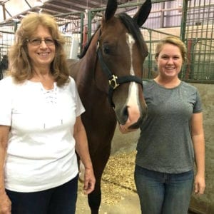 Today being sale day, we snapped a quick picture of Nancy Ellis of Indiana and Carra Eisenbies of South Carolina with one of the consigned yearlings.