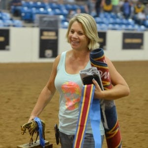 Tonya Brown earned the last world champion title of the day in the Ford Truck Arena, showing Blazing Moonlight to win Senior Western Riding for Bruce and Bobbi Shaw. Photo © NSBA